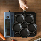 🍳🔥 4-Tassen-Eier-Bratpfanne aus Gusseisen – Antihaftbeschichtung für perfektes Wenden & langlebige Qualität! 🥚👨‍🍳 Ideal für gesundes Frühstück und Familienbrunch. 🌿