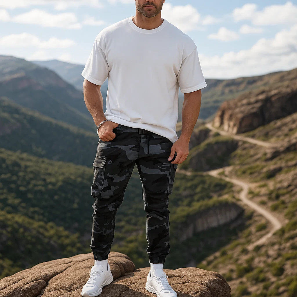 🌿🏕️ Herren Camouflagehose – Tarnmuster 🎯🔍 wasserabweisend & robust für Outdoor-Jagd, Angeln, taktische Einsätze mit vielen Taschen