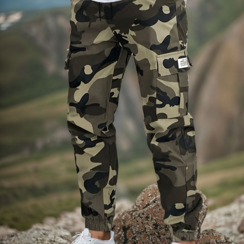 🌿🏕️ Herren Camouflagehose – Tarnmuster 🎯🔍 wasserabweisend & robust für Outdoor-Jagd, Angeln, taktische Einsätze mit vielen Taschen