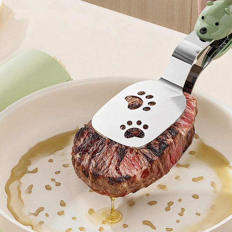 ✨✨2-in-1 Pfannenwender & Zange aus Edelstahl🥦☘️Mit Ölablauf für gesünderes Braten