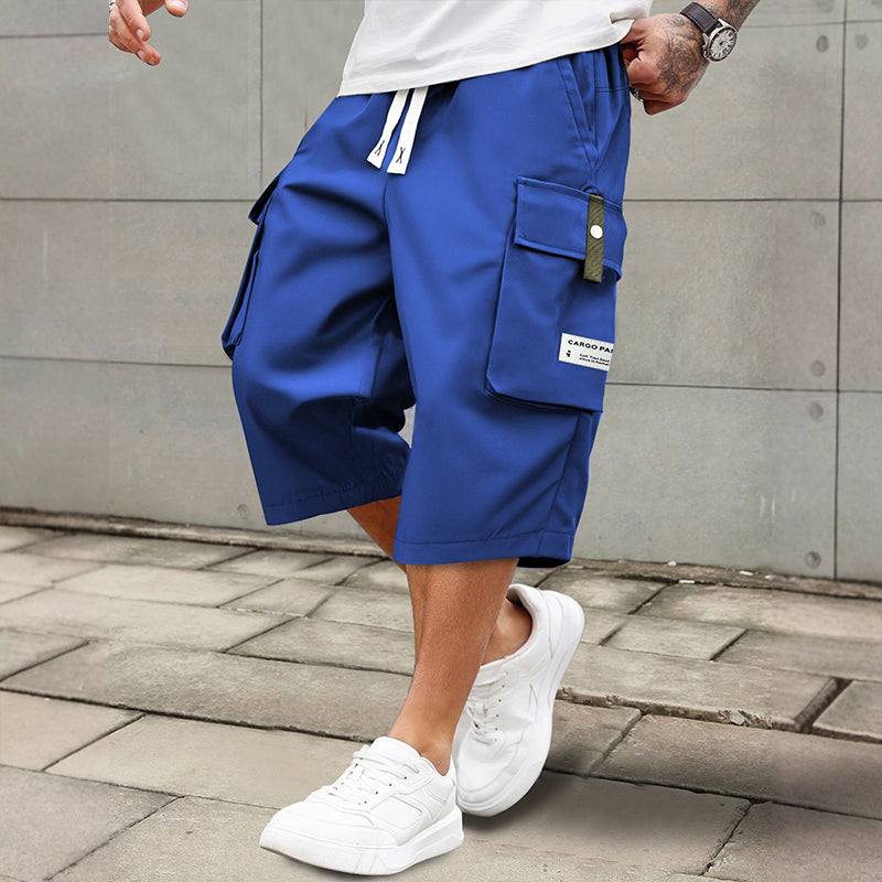 ✨🔥 Lässige 3/4-Cargo-Hose mit Kordelzug für Herren – ideal für urbane Abenteuer & warme Tage 🚀💪 Dank praktischer Taschen und lässigem Schnitt maximaler Komfort und Stil.