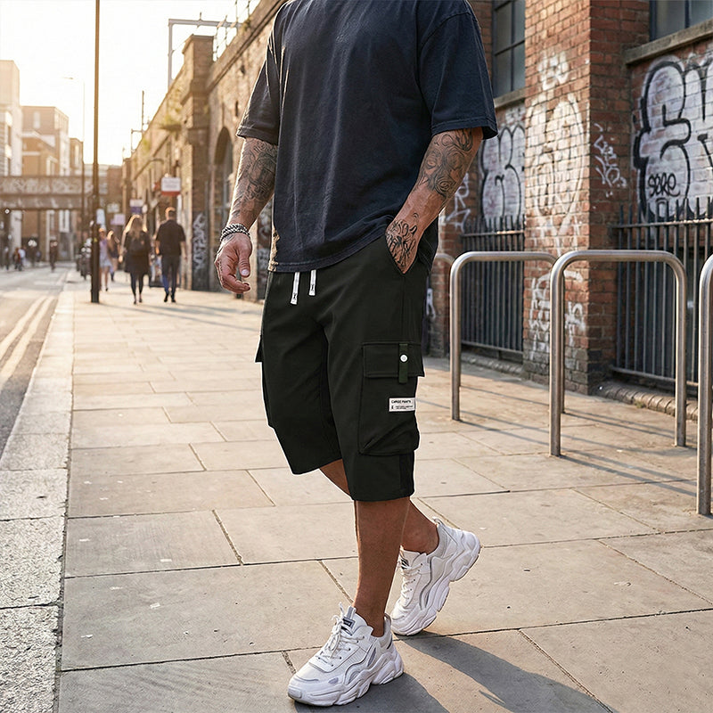 ✨🔥 Lässige 3/4-Cargo-Hose mit Kordelzug für Herren – ideal für urbane Abenteuer & warme Tage 🚀💪 Dank praktischer Taschen und lässigem Schnitt maximaler Komfort und Stil.