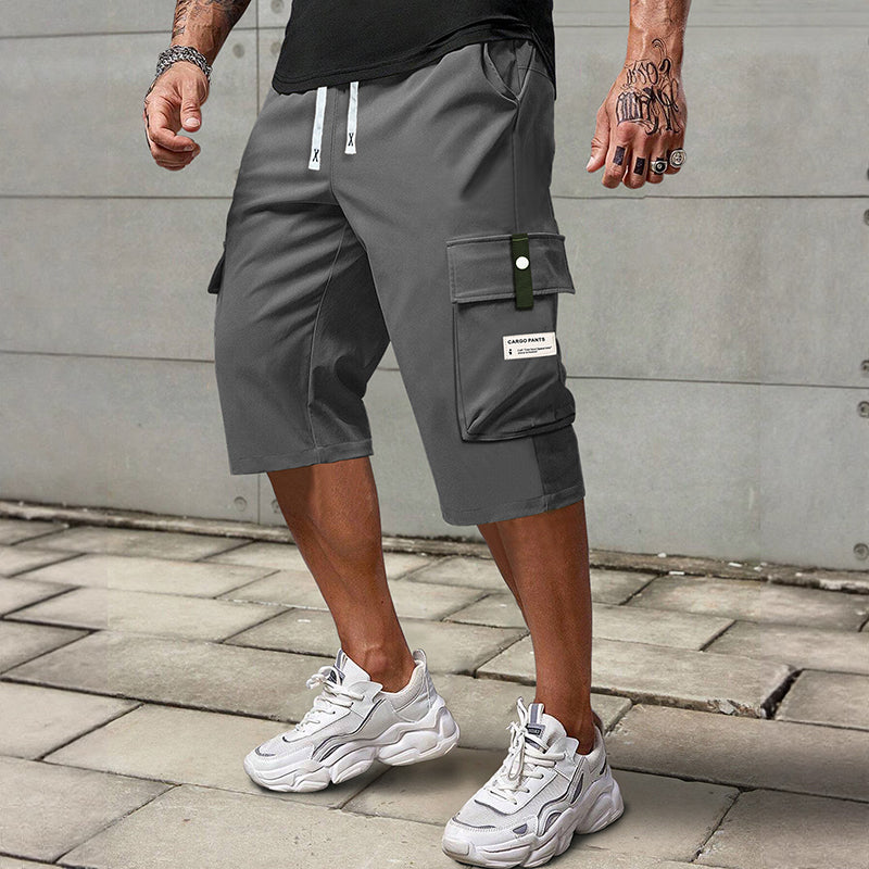 ✨🔥 Lässige 3/4-Cargo-Hose mit Kordelzug für Herren – ideal für urbane Abenteuer & warme Tage 🚀💪 Dank praktischer Taschen und lässigem Schnitt maximaler Komfort und Stil.