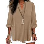 👗✨ Lässiges einfarbiges Oberteil mit seitlichem Schlitz und Knöpfen – vielseitig kombinierbar für jeden Tag. 🌿👚 Perfekt für einen mühelosen, stylischen Look. Ideal für Büro, Freizeit oder besondere Anlässe. Jetzt entdecken und Lieblingsteil sichern!